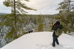 Young woman takes photo in winter - Pix on Trips