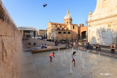 Kids play in a water fountain in Rome, Italy - Pix on Trips