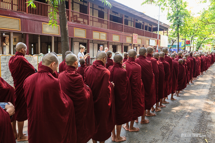 Monks line up for lunch at Mahagandayon Monastery