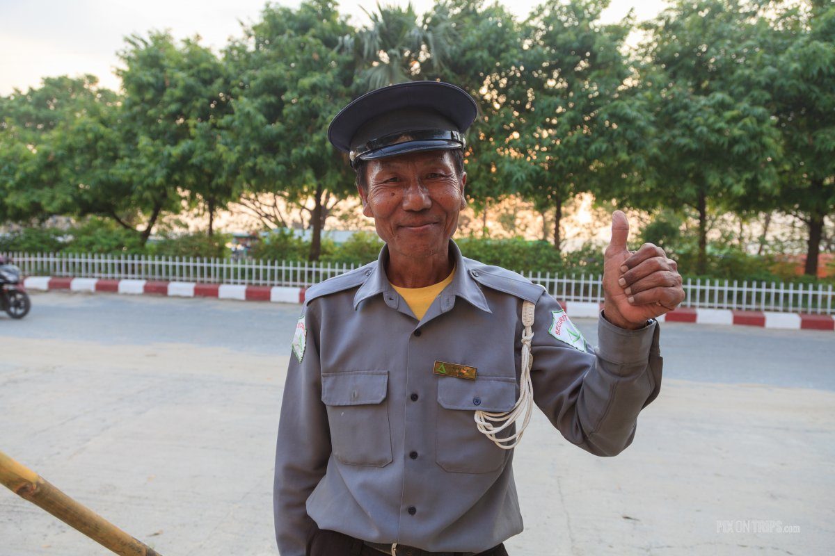 Security officer in front Ayarwaddy River View Hotel, Mandalay, Myanmar