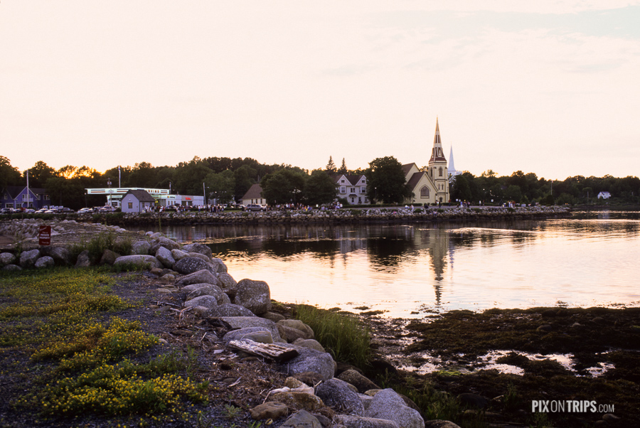 Harbour of Mahone Bay at sunset with churches in the background