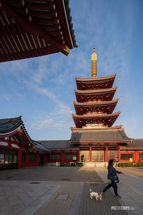 Woman passes by the Five-Story Pagoda at Sensoji, Asakusa, Tokyo, Japan - Pix on Trips
